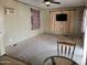 Spacious living room perfect for entertaining, and cozy carpeting at 61 W Southern Ave # 63, Mesa, AZ 85210