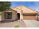 Charming single-story home with a well-maintained desert-landscaped yard and an attached two-car garage at 6482 S Claiborne Ave, Gilbert, AZ 85298