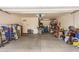 Spacious two-car garage with ample storage space and concrete flooring at 6482 S Claiborne Ave, Gilbert, AZ 85298