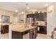 Shows an eat-in kitchen with granite countertops and stainless steel appliances at 6482 S Claiborne Ave, Gilbert, AZ 85298
