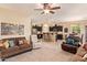 Open-concept living area that flows into the kitchen, offering ample seating and natural light at 6482 S Claiborne Ave, Gilbert, AZ 85298