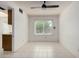Bright dining area featuring tile floors and a window at 6853 S Roosevelt St, Tempe, AZ 85283