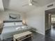 Bright bedroom with comfortable bed, stylish decor, and a view into another room at 6945 E Osborn Rd # E, Scottsdale, AZ 85251