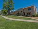 Attractive two-story apartment building with well-maintained landscaping at 6945 E Osborn Rd # E, Scottsdale, AZ 85251