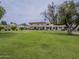 Spacious community green space, mature trees, and well-maintained townhouses at 6945 E Osborn Rd # E, Scottsdale, AZ 85251