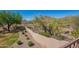 Backyard with wall, desert landscaping, and mountain views at 7445 E Eagle Crest Dr # 1061, Mesa, AZ 85207