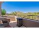 Balcony with seating and fire pit overlooking mountain views at 7445 E Eagle Crest Dr # 1061, Mesa, AZ 85207