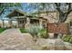 Beautiful exterior entrance to the community spa and fitness center with lush landscaping at 7445 E Eagle Crest Dr # 1061, Mesa, AZ 85207