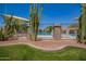 Community pool area with cacti, offering a relaxing spot for residents to enjoy swimming and sunbathing at 7808 E Lewis Ave, Scottsdale, AZ 85257