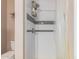Tiled shower with white subway tiles, neutral walls, and modern showerhead fixture at 7808 E Lewis Ave, Scottsdale, AZ 85257