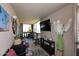 Screened-in balcony with space for seating and a TV at 7860 E Camelback Rd # 404, Scottsdale, AZ 85251