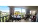Outdoor seating on a screened-in balcony with scenic views at 7860 E Camelback Rd # 404, Scottsdale, AZ 85251