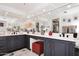 Bathroom vanity with a counter, cabinets, drawers, and mirrors at 7860 E Camelback Rd # 404, Scottsdale, AZ 85251