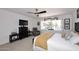 Bright bedroom with a ceiling fan, and a large window for plenty of natural light at 7860 E Camelback Rd # 404, Scottsdale, AZ 85251
