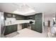 Modern kitchen with stainless steel appliances, tile backsplash, and ample counter space at 7860 E Camelback Rd # 404, Scottsdale, AZ 85251