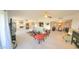 Bright living room featuring a ceiling fan, modern furniture, and access to other rooms of the house at 7860 E Camelback Rd # 404, Scottsdale, AZ 85251