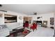 Inviting living room showcasing modern decor, comfortable seating, and a glimpse of the kitchen at 7860 E Camelback Rd # 404, Scottsdale, AZ 85251