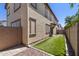 This outdoor area features artificial turf with rock and pavers along the border at 8313 E Impala Ave, Mesa, AZ 85209