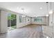 Bright and airy living room with sliding doors leading to the backyard at 8313 E Impala Ave, Mesa, AZ 85209