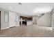 Open-concept living room featuring tile floors and an abundance of natural light at 8313 E Impala Ave, Mesa, AZ 85209