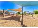 Community playground with swings and play equipment, offering a safe and fun environment for children at 8313 E Impala Ave, Mesa, AZ 85209