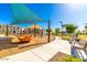 Colorful community playground with benches and play equipment, perfect for ' outdoor adventures at 8313 E Impala Ave, Mesa, AZ 85209