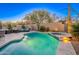 Backyard with pool, spa, and outdoor seating with mountain views at 10772 E Running Deer Trl, Scottsdale, AZ 85262