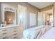 Bright bedroom featuring neutral walls, and a beautiful desert view at 10772 E Running Deer Trl, Scottsdale, AZ 85262