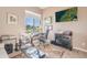 Home office with desk, decor, large windows and natural light at 10772 E Running Deer Trl, Scottsdale, AZ 85262