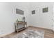 Inviting entryway featuring hardwood floors, a console table, neutral decor, and a stylish area rug at 10956 E Thunderbolt Ave, Mesa, AZ 85212