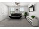 Relaxing living room with a comfortable sofa, television, and lots of space at 10956 E Thunderbolt Ave, Mesa, AZ 85212