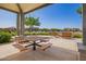 Shaded picnic area featuring picnic tables and comfortable seating for outdoor enjoyment in a community space at 10956 E Thunderbolt Ave, Mesa, AZ 85212