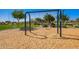 Community playground with swings, mature trees, and lush landscaping in a well-maintained park at 10956 E Thunderbolt Ave, Mesa, AZ 85212