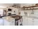 Modern kitchen with stainless steel appliances and open design at 1110 W Heatherbrae Dr, Phoenix, AZ 85013
