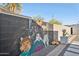 Quirky backyard featuring a mural, cacti, and crushed gravel at 1111 E Coronado Rd, Phoenix, AZ 85006