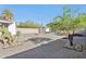 Large backyard with plenty of crushed gravel and a shed at 1111 E Coronado Rd, Phoenix, AZ 85006