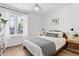 Calm bedroom offers natural light, neutral tones, and hardwood-style flooring at 1111 E Coronado Rd, Phoenix, AZ 85006