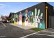 Building exterior featuring colorful murals, modern design elements, and street-side appeal, enhancing the property's character at 1111 E Coronado Rd, Phoenix, AZ 85006