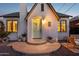 Charming white brick home featuring a quaint entrance, slate roof, and a well-maintained front yard at 1111 E Coronado Rd, Phoenix, AZ 85006