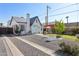 Charming two-story home with a well manicured front yard and turquoise front door at 1111 E Coronado Rd, Phoenix, AZ 85006
