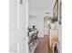 Inviting foyer with hardwood floors, arched doorways, and stylish decor accents and furnishings at 1111 E Coronado Rd, Phoenix, AZ 85006