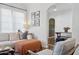 Cozy living room with comfortable seating, arched doorways and bright, neutral colors and natural lighting at 1111 E Coronado Rd, Phoenix, AZ 85006