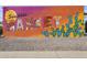 Colorful painted mural on the exterior of a building, showcasing vibrant imagery and creative design elements at 1111 E Coronado Rd, Phoenix, AZ 85006