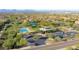 A neighborhood offers amenities, including pool, tennis, and basketball courts at 11550 E Paradise Ln, Scottsdale, AZ 85255