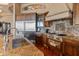 Gourmet kitchen featuring stainless steel appliances, custom cabinetry, and granite countertops at 11550 E Paradise Ln, Scottsdale, AZ 85255