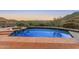 Backyard pool and spa with desert landscaping for privacy and gorgeous sunset views at 11550 E Paradise Ln, Scottsdale, AZ 85255