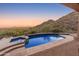 Inviting backyard pool and spa overlooking city and mountain views perfect for relaxing or entertaining outdoors at 11550 E Paradise Ln, Scottsdale, AZ 85255