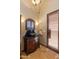 Charming powder room with a unique vessel sink, designer fixtures, and stylish accents at 11550 E Paradise Ln, Scottsdale, AZ 85255
