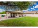 Large backyard with covered patio, offering ample space for outdoor activities and enjoyment at 13137 W Wilshire Dr, Goodyear, AZ 85395