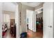 Hallway with doors to rooms and closet at 13137 W Wilshire Dr, Goodyear, AZ 85395